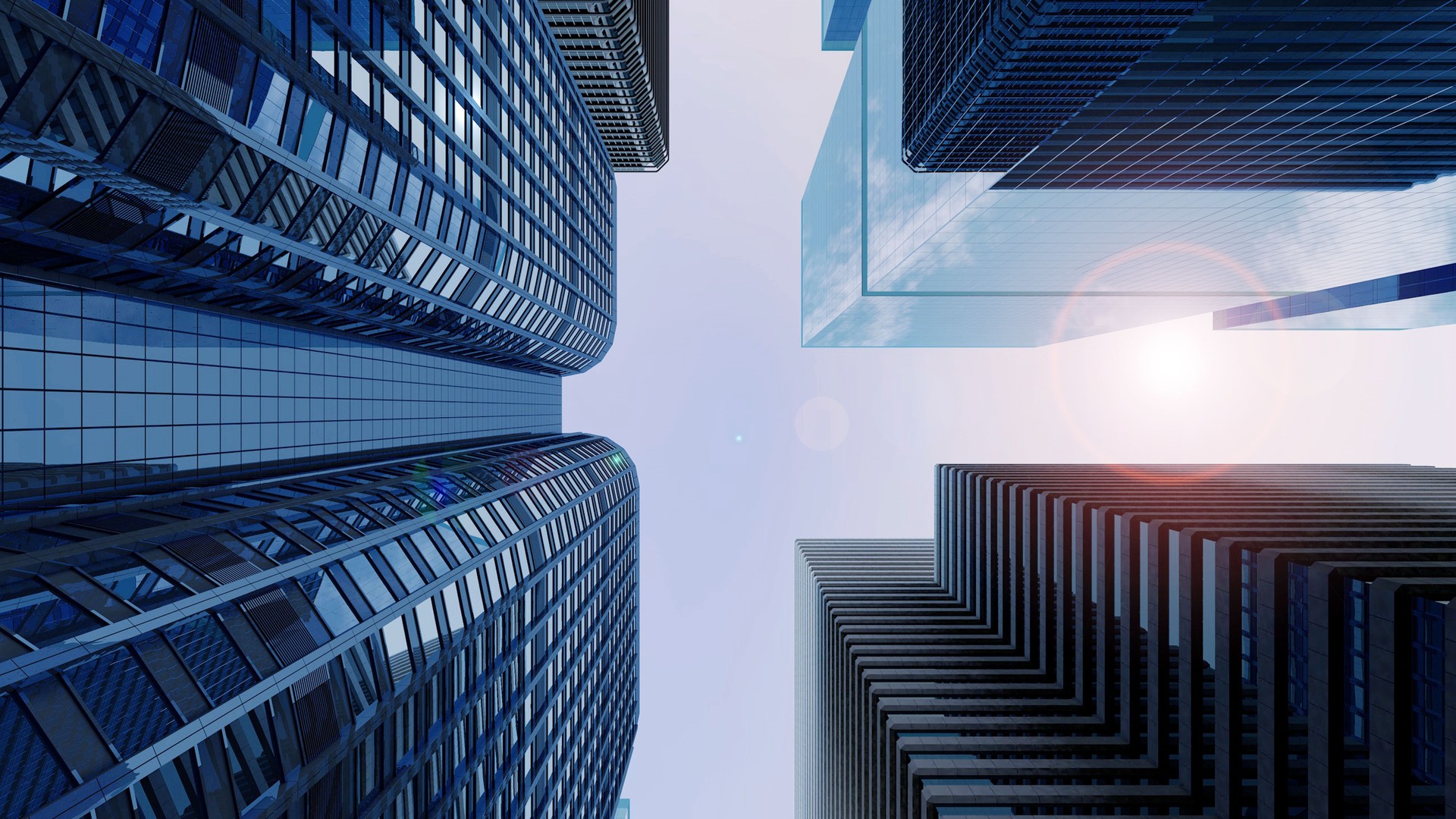 Upward view of the urban skyline between skyscrapers of the financial district in central.